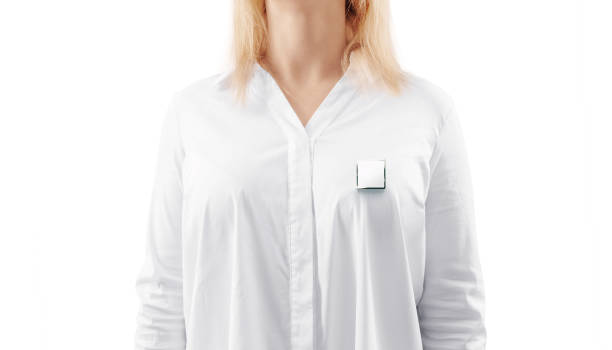 istock Blank white square silver lapel badge mockup on woman chest 922417640