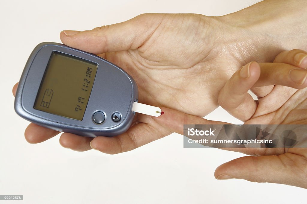 Diabetes self-test  Analyzing Stock Photo