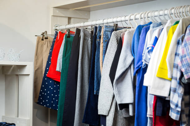istock Clothes hang on a shelf in a designer store 922426118