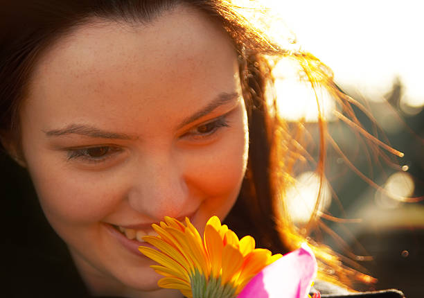 istock Smiling girl with flower 92242723