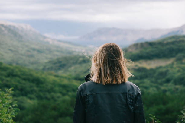 istock Traveler woman watching scenery 922428894