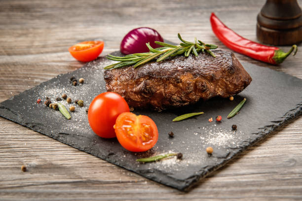 istock Fresh grilled meat with herbs and spices 922428998
