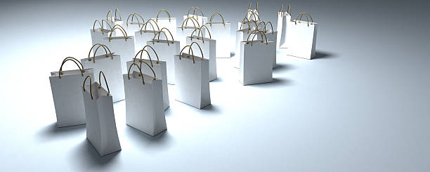 istock White shopping bags in a pool of light 92243346