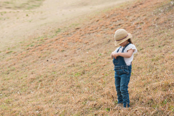 istock Little girl playing in the park 922433918