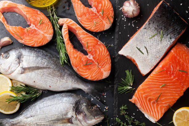 istock Raw salmon and dorado fish fillet 922434526