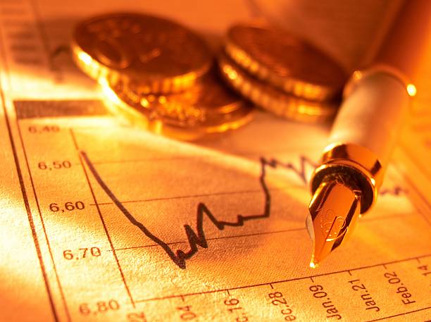 istock Coins and fountain pen on stock page 92243829