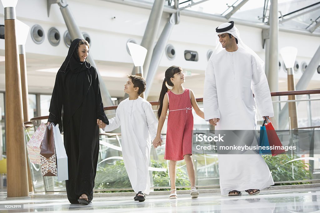 Middle Eastern family in shopping mall  West Asian Ethnicity Stock Photo