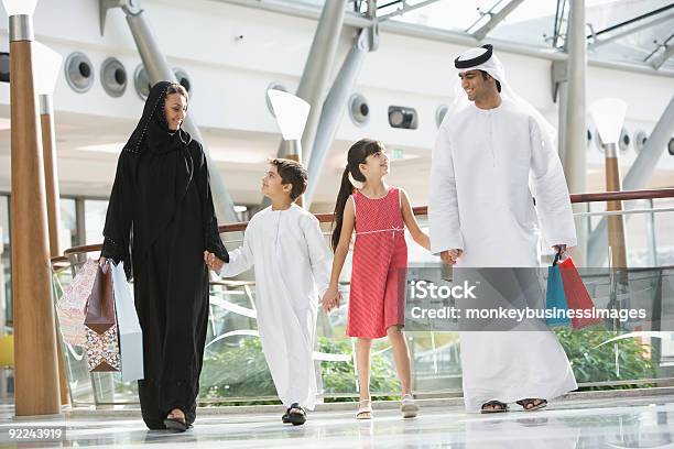 Middle Eastern Family In Shopping Mall Stock Photo - Download Image Now - West Asian Ethnicity, Family, Shopping