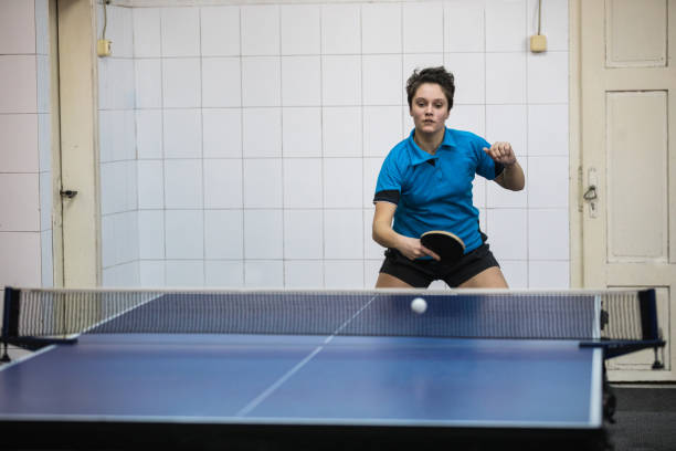 istock Table tennis player playing indoors 922439804