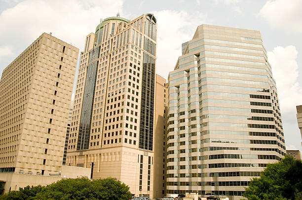 istock Three tall office building in warm colors 92244638