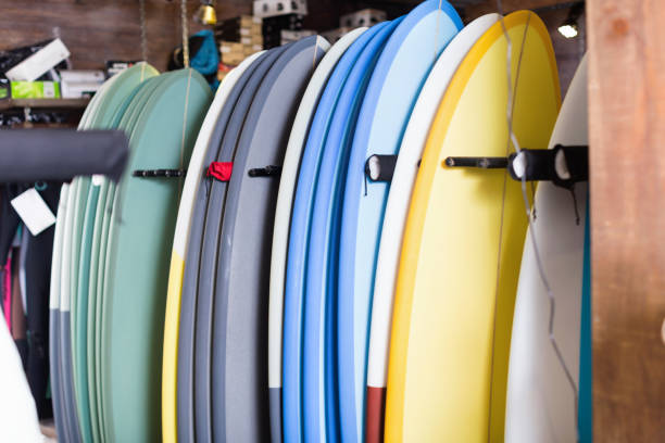 istock Image of colorful surfboard standing in store 922448376