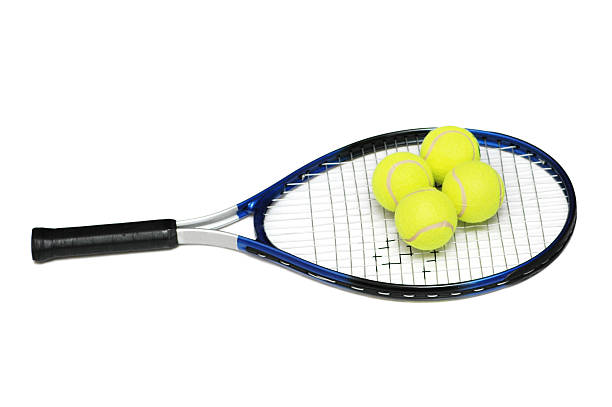 istock Tennis rackets and four balls isolated on white 92245118