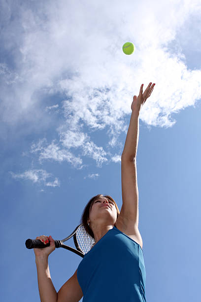 istock Female Tennis Player Tossing a Serve 92245989