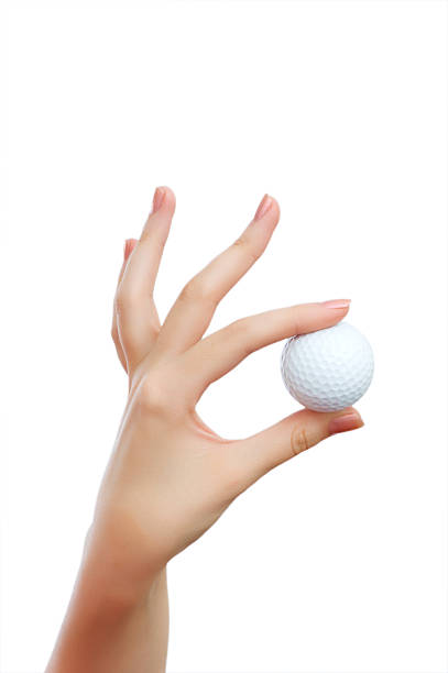istock Hand holding golf ball isolated on the white 92246108