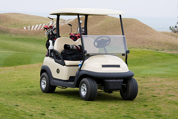 istock Golf car with clubs and camera on a course 92246271