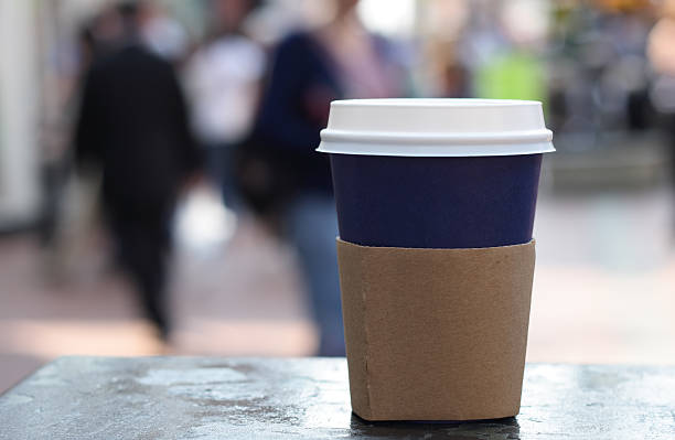 food drink - cup of coffee on a street background  togo stock pictures, royalty-free photos & images