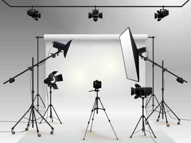 Photography studio vector. Photo studio white blank background with soft box light, camera, tripod and backdrop. Vector illustration. Isolated on white background Photography studio vector. Photo studio white blank background with soft box light, camera, tripod and backdrop. Vector illustration. Isolated on white background workshop photos stock illustrations