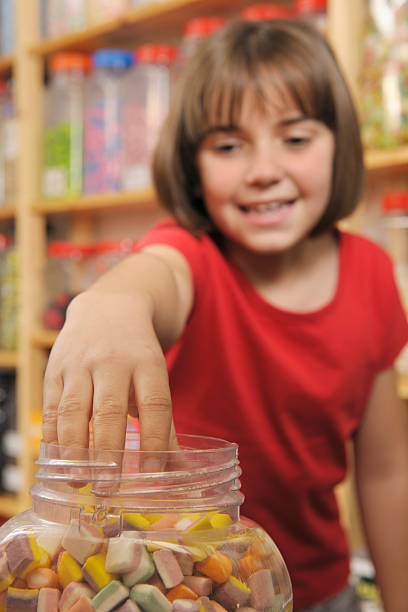 istock child in sweet shop 92247433