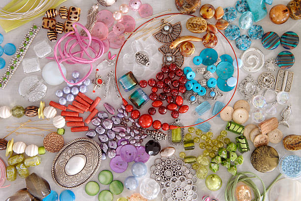 Various beads and other jeweler-making items stock photo