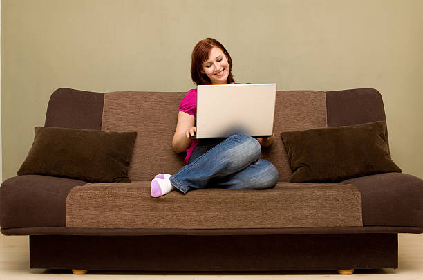 Donna con laptop - foto stock