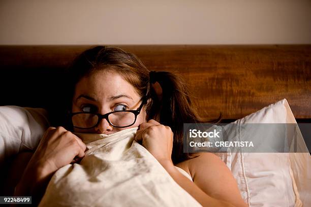 Frightened Woman In Bed Stock Photo - Download Image Now - Adult, Adults Only, Bed - Furniture