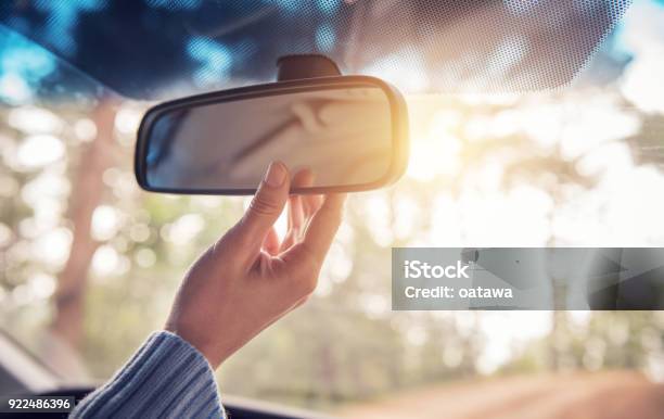 Hand Adjusting Rear View Mirror Safety Concept Stock Photo - Download Image Now - Rear-View Mirror, Mirror - Object, Car