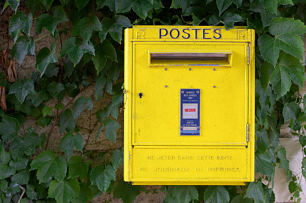 istock Yellow French post box on wall, chateau de chenonceau 92248930