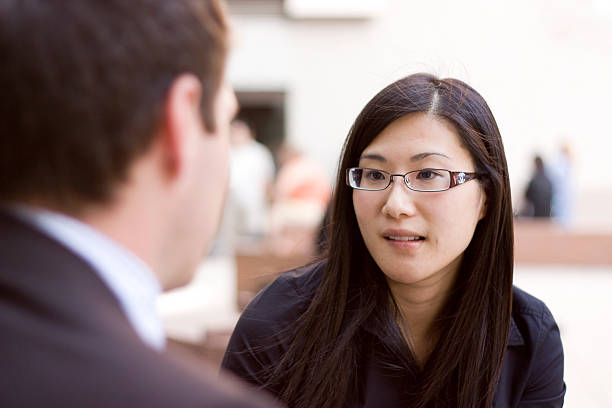 istock Asian businesswoman in conversation 92249108