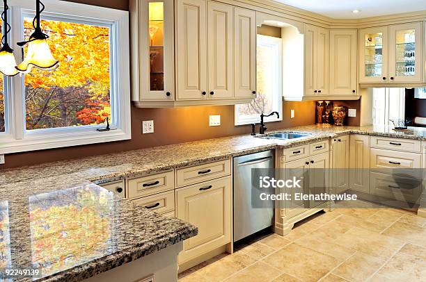 The Interior Of A Modern Kitchen In A Home With Marble Stock Photo - Download Image Now