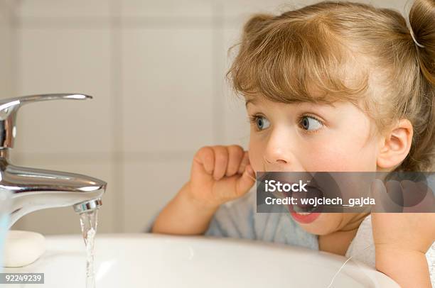 Cute Girl Cleaning Teeth By Floss Stock Photo - Download Image Now - Dental Floss, Child, Brushing Teeth