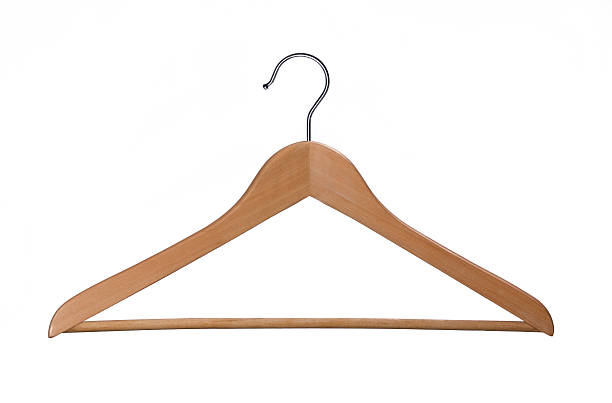 Coat Hanger Wooden coat hanger. Other images from the seris. hook equipment photos stock pictures, royalty-free photos & images