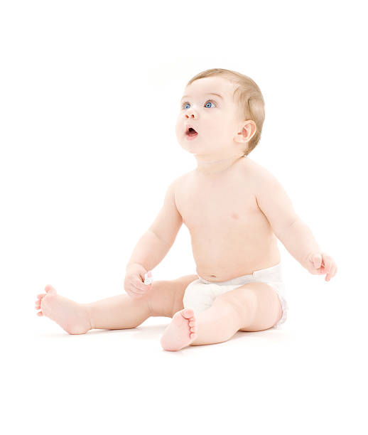 istock baby boy in diaper with toothbrush 92249586