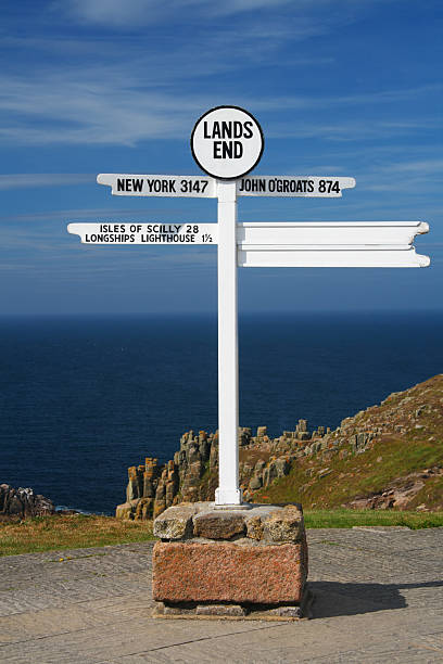 istock white Land's end directional sign over sea and cliffs background 92249611