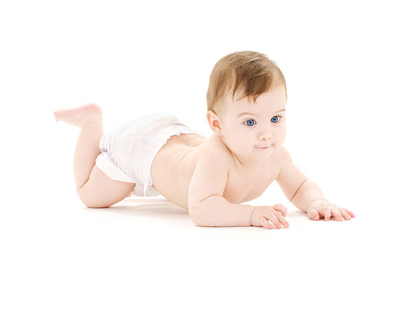istock A cute baby boy in a diaper crawling on a white background 92249627