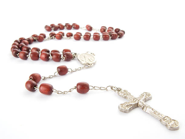 istock Wooden bead rosary on white background 92250118