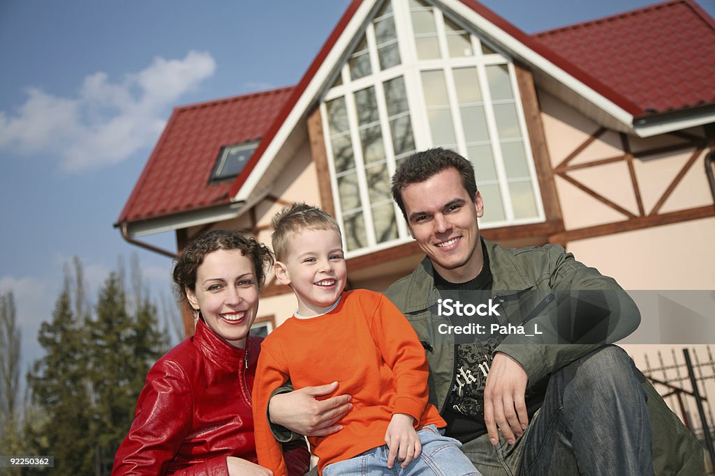 smile family and house  Adult Stock Photo