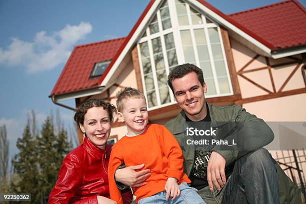 Smile Family And House Stock Photo - Download Image Now - Adult, Boys, Cheerful