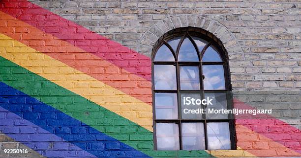 Colurfull Window Framed Stock Photo - Download Image Now - Blue, Brick, Brick Wall