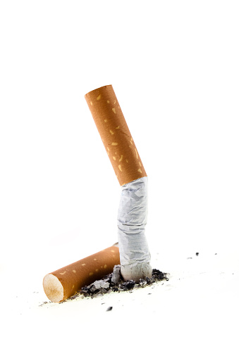A single rolled cigar on a white background.