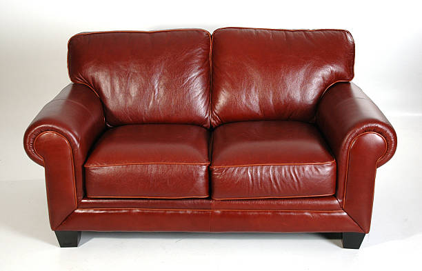 istock Chestnut leather love seat with rounded arms and cushions  92252169