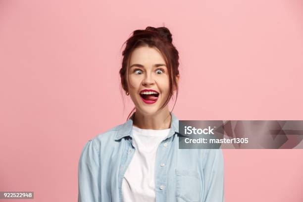 The Squint Eyed Woman With Weird Expression Isolated On Pink Stock Photo - Download Image Now