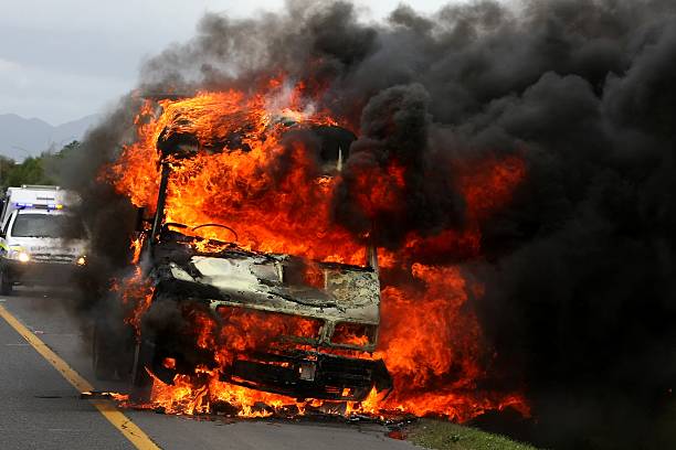 istock Burning Van with Police car in Background 92252309