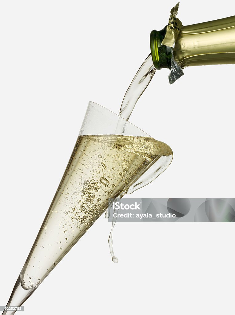 Gießen in ein Glas Champagner - Lizenzfrei Alkoholisches Getränk Stock-Foto