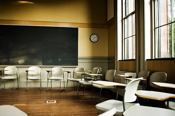 Missing students  classroom empty education desk stock pictures, royalty-free photos & images