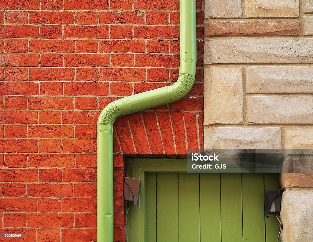 Brick Wall and Rain Gutter  Architecture Stock Photo