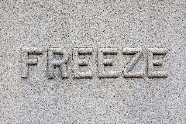istock The Word Freeze Carved On a Tombstone 92253054
