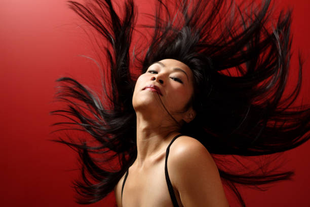istock Asian model flipping her hair 92253229
