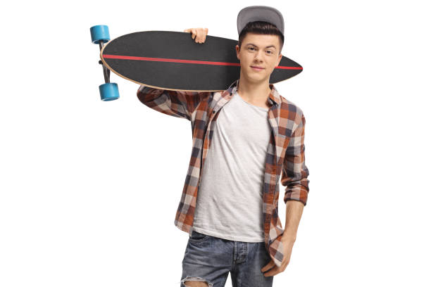 istock Teenage hipster holding a longboard 922535860
