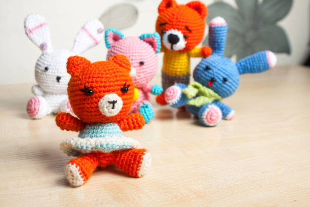 istock knitted toy cat, bear, rabbit, hare, handmade 922535992