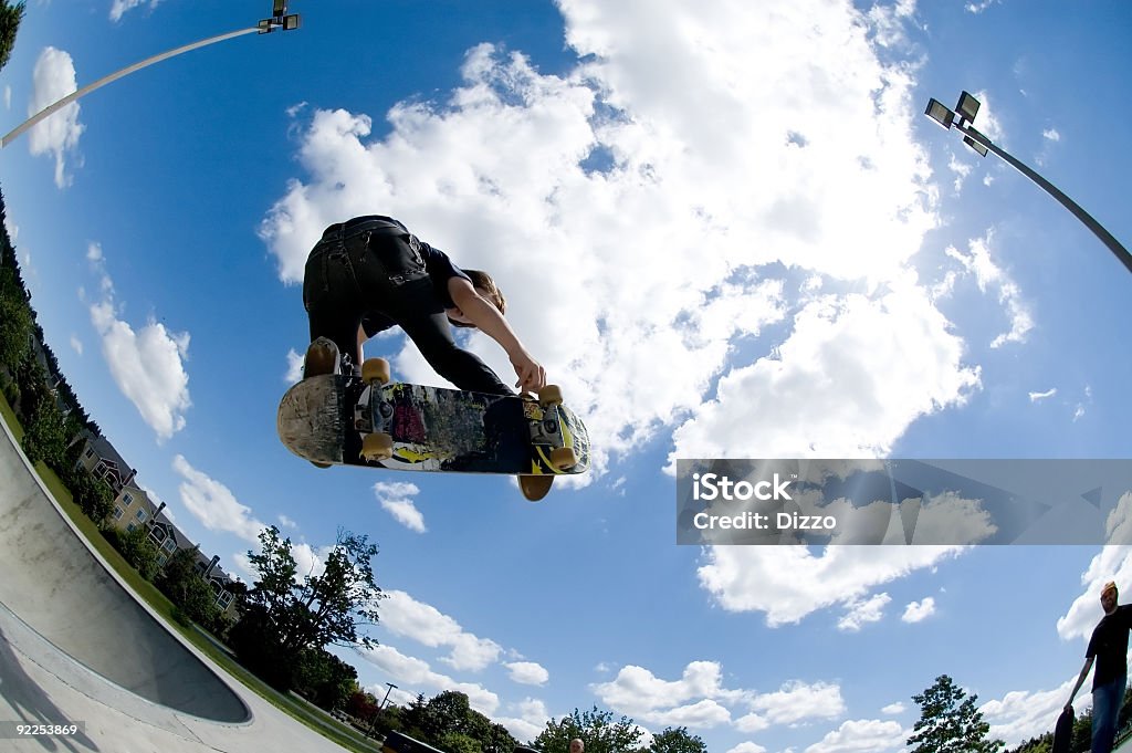 Shot of a skateboard trick catching air Big air! Skateboarding Stock Photo